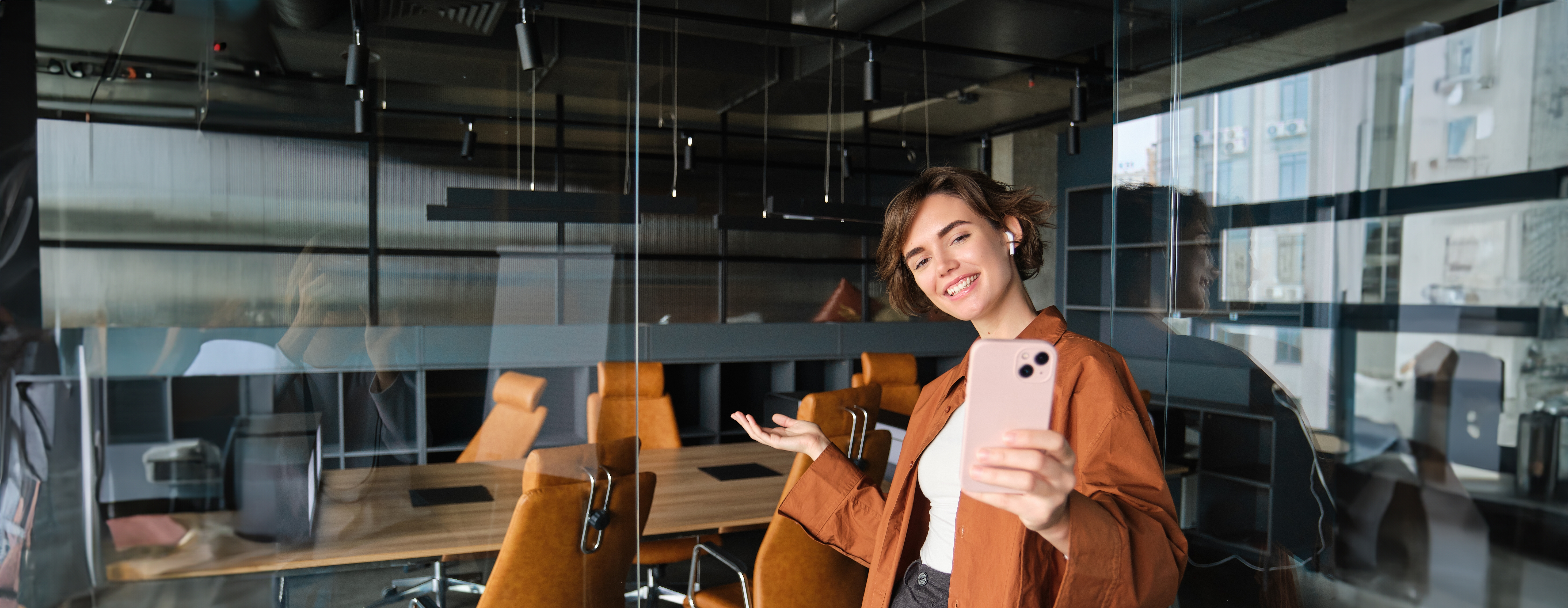 Person taking a selfie in an office