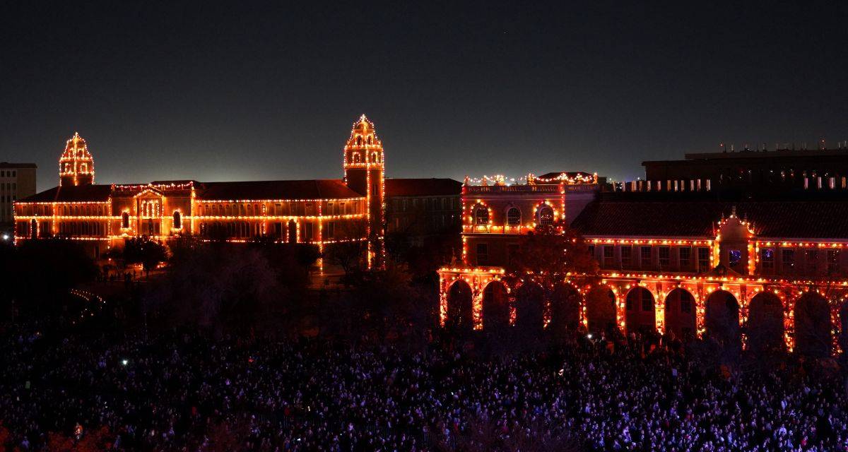 Image from a room of christmas lights on at night on the Administrative and Chemistry buildings