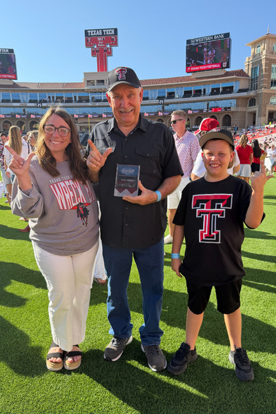 Jenny Brown, Gary Minter, and child