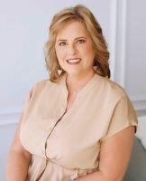Headshot photo of Nanette Riley