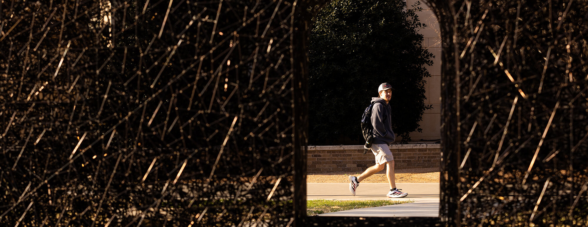 person walking around tech tech campus