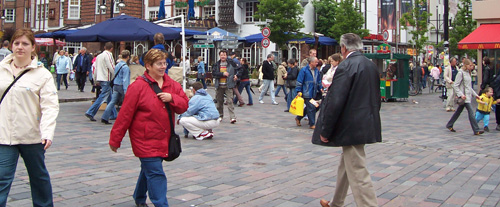 people walking on a street