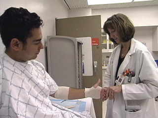Physician Assistant examines patient