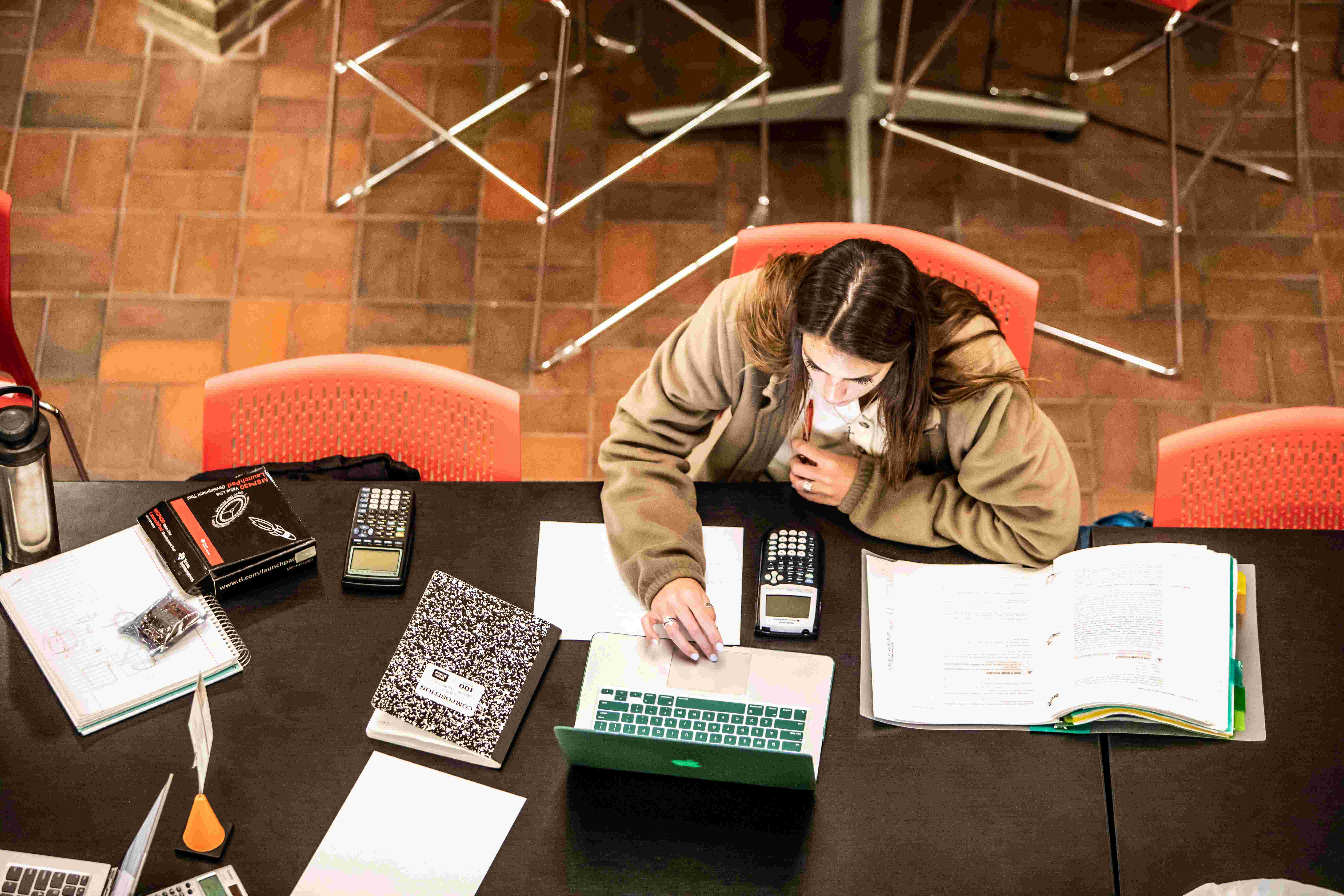 Image from above a table with student studying.