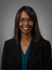 Headshot of Tracy Givens, director of UWC