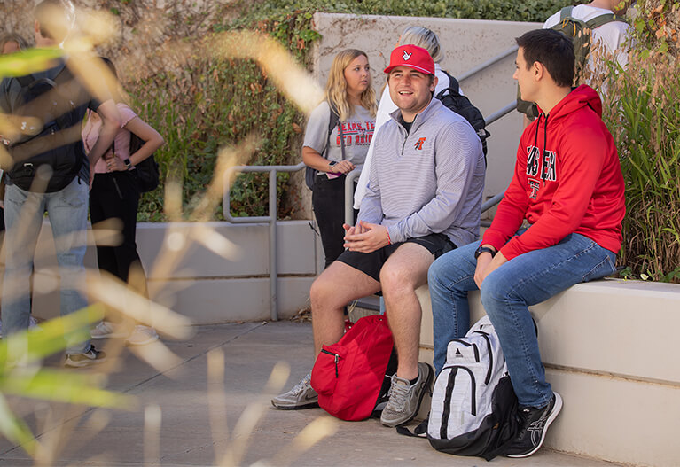 Students Fanging out Outside Campus Building