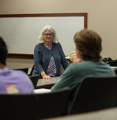 Teacher Smiling in Class