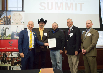 Regional leaders stand together as they display the proclamation they just signed at the summit.