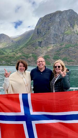 Martha Clabby Kjolseth of USN with Jeffrey Harper and Dean Margaret Williams