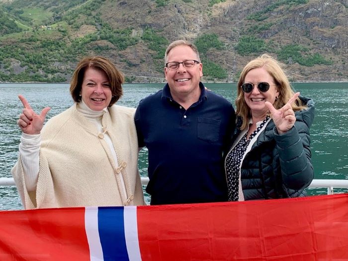 USN and Rawls faculty with Norway flag