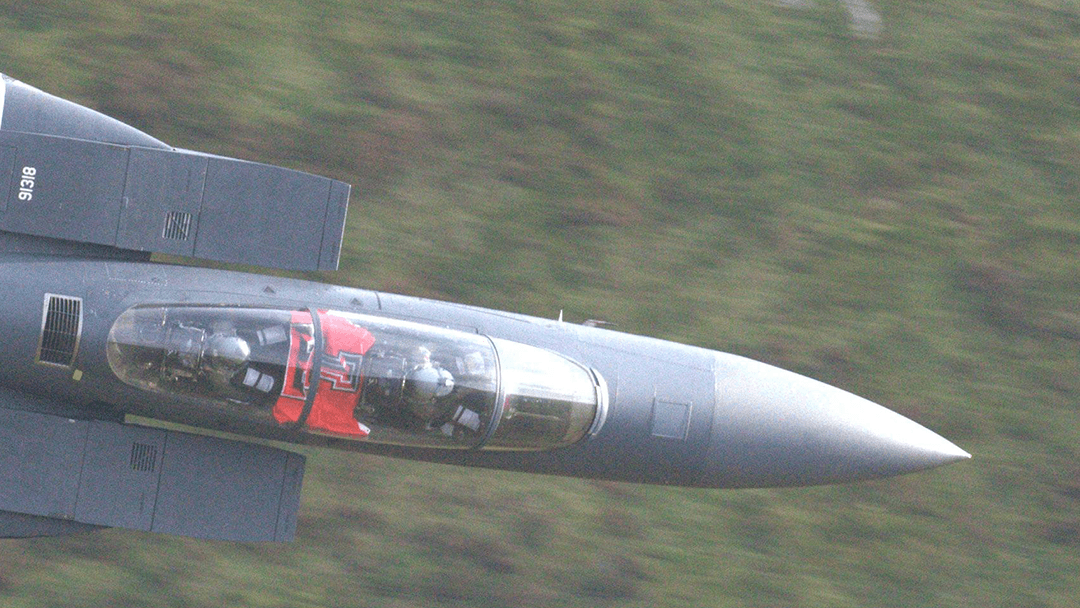 Capt. Scott Hicks flying an F-15E Strike Eagle through the Mach Loop. Photo courtesy of Dafydd Phillips.