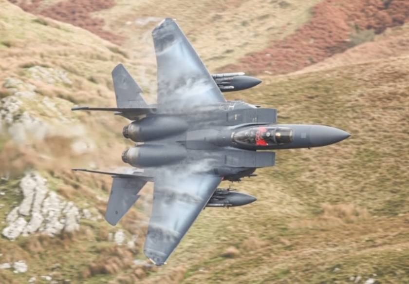 Capt. Scott Hicks flying an F-15E Strike Eagle through the Mach Loop. Photo courtesy of Dafydd Phillips.