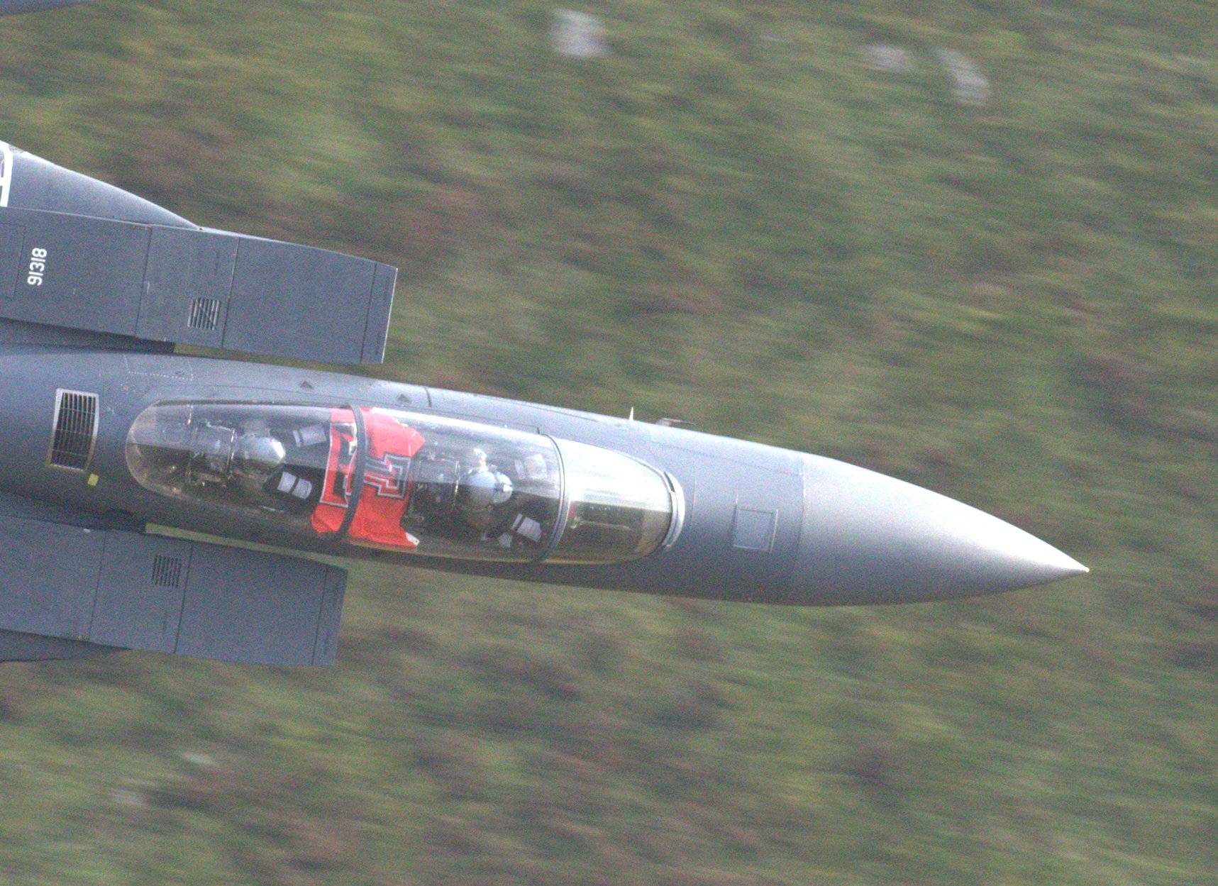 Capt. Scott Hicks proudly displays the flag of his alma mater in his cockpit while flying through the Mach Loop. Photo courtesy of Andrew Doggett.