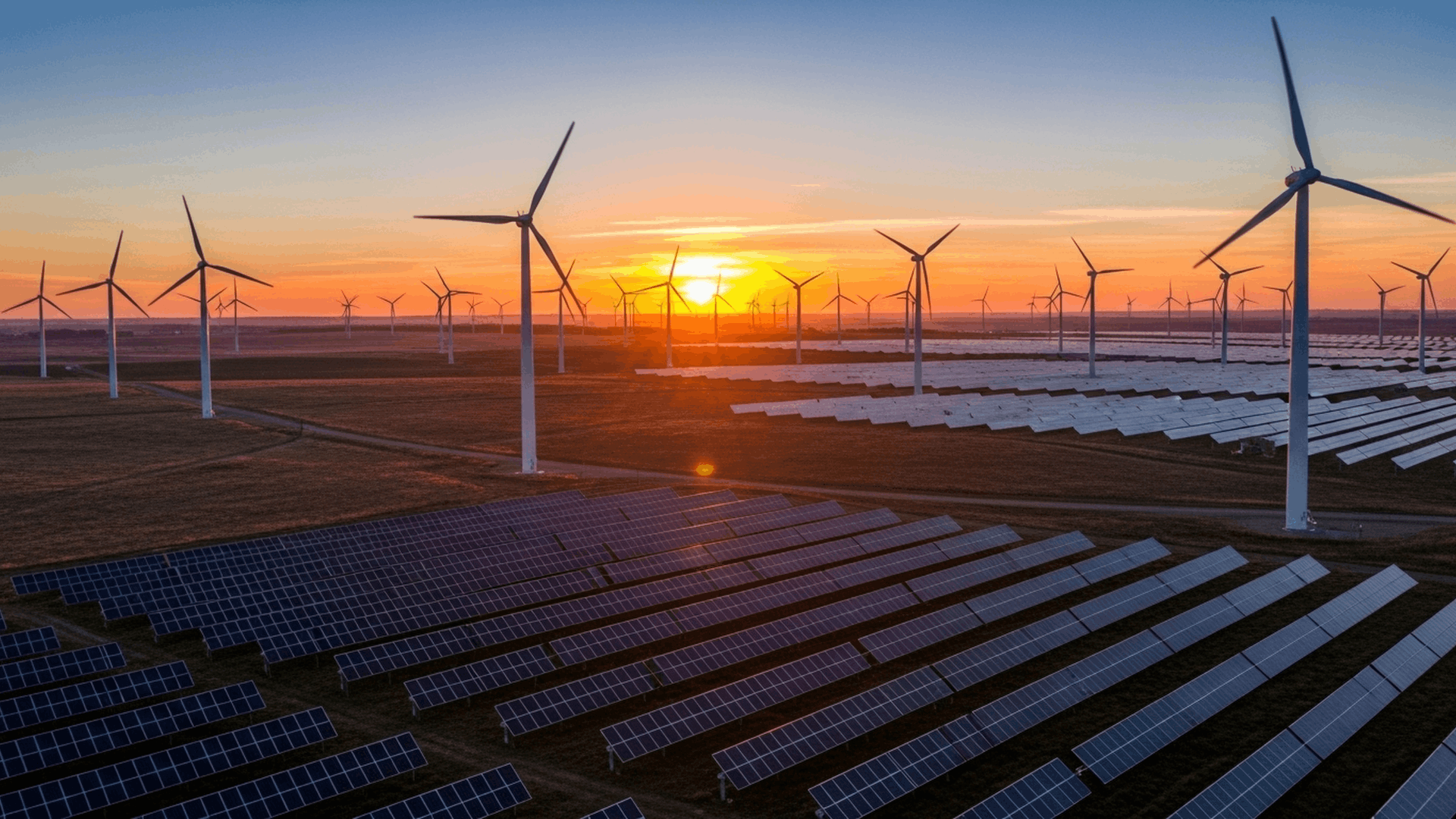 Wind turbines at sunset in West Texas representing the Texas Tech Renewable Energy graduate program