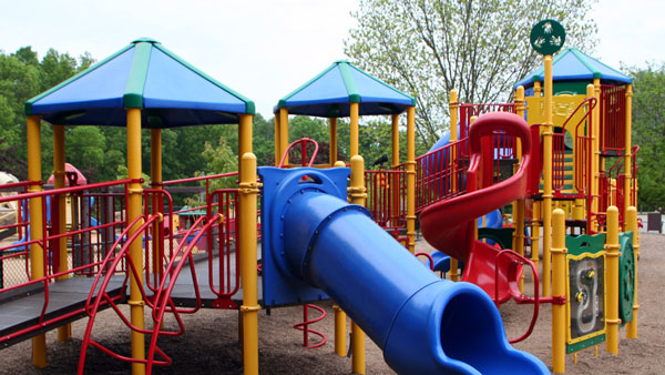 A color playground at midday.