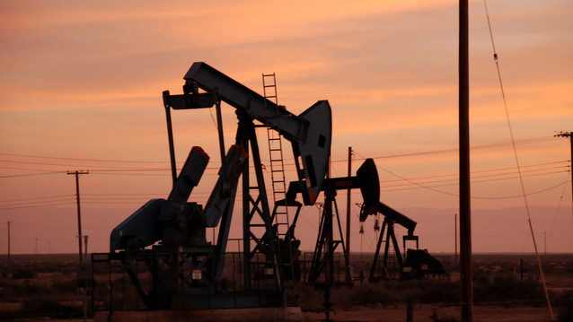 oil pumps at sunset