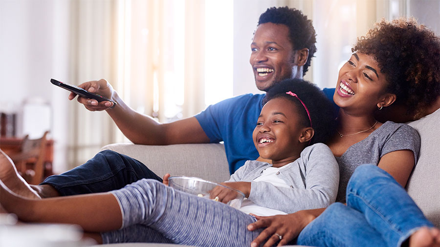 family watching television together