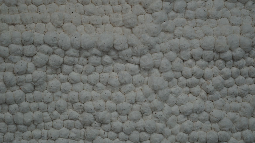 raw cotton as clouds in art installation