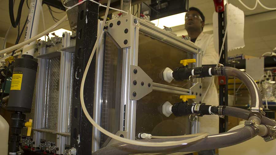 man operating filtration system