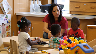 Teacher with children