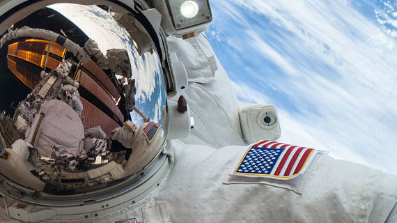 astronaut with earth in background