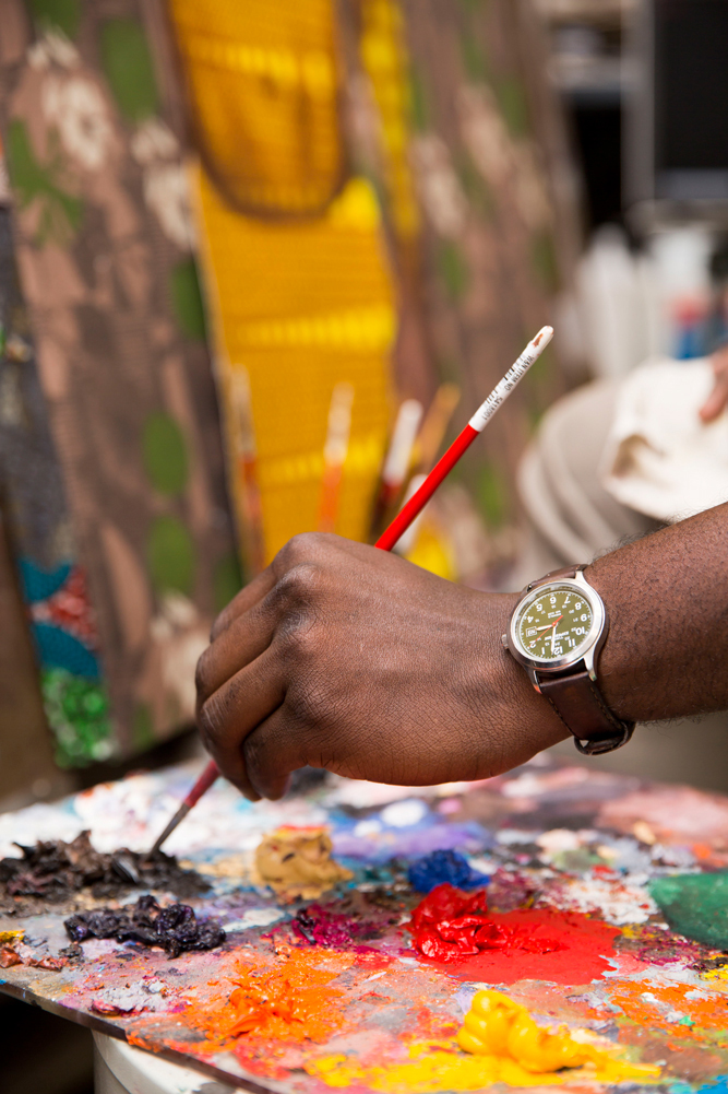 close up of quarm picking paint off of board