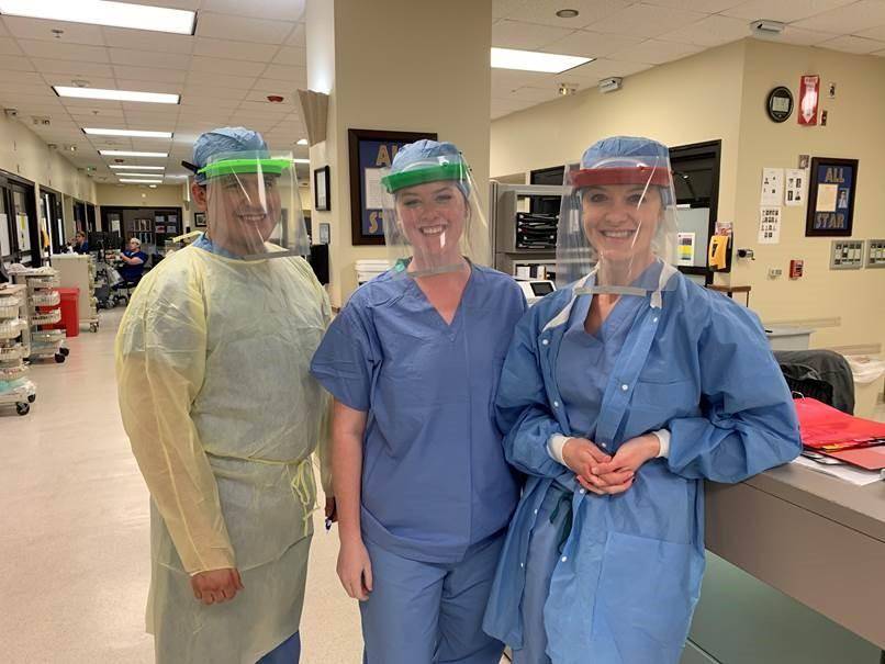 Healthcare workers wearing face shields