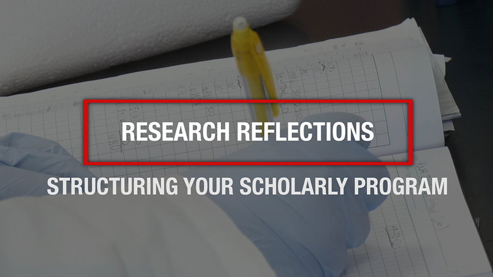 Text of "Research Reflections: Structuring Your Scholarly Program" superimposed over a lab assistant writing data in a grid-lined notebook.