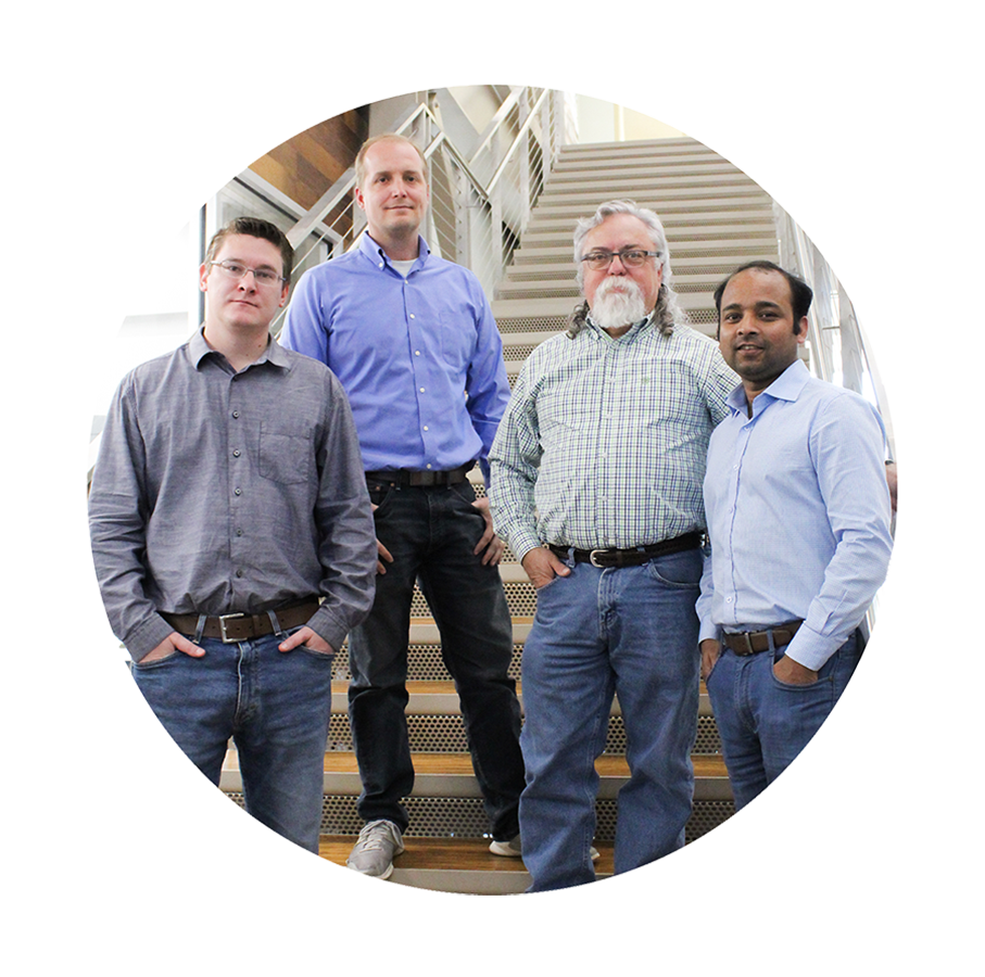 Zach Hinds, Brendan Kelly, Wylie Bomar, and Abu Sayeed stand at the Innovation Hub staircase