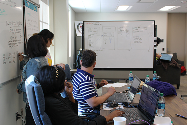 students meeting in conference room
