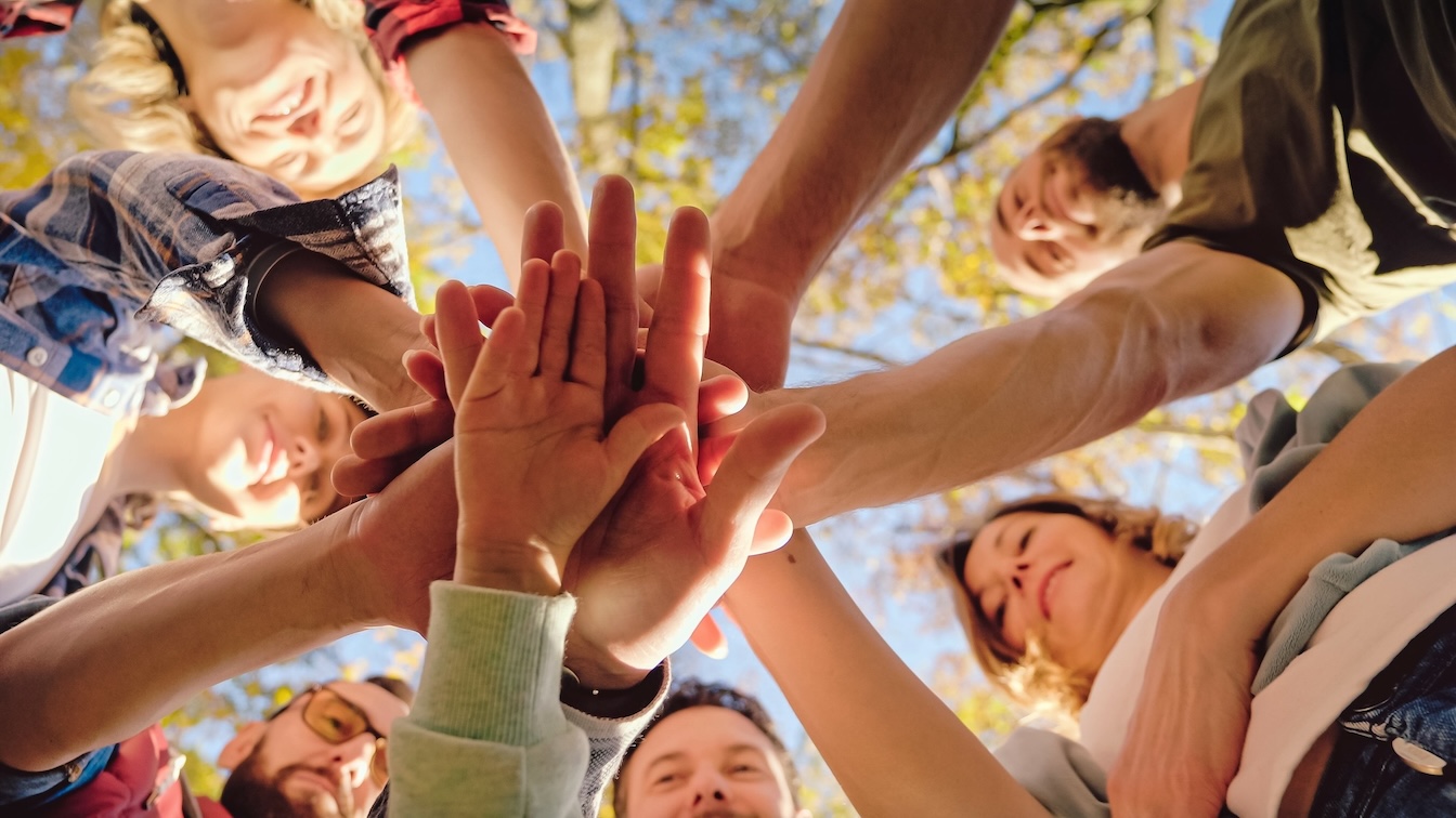 hands together in center of a circle