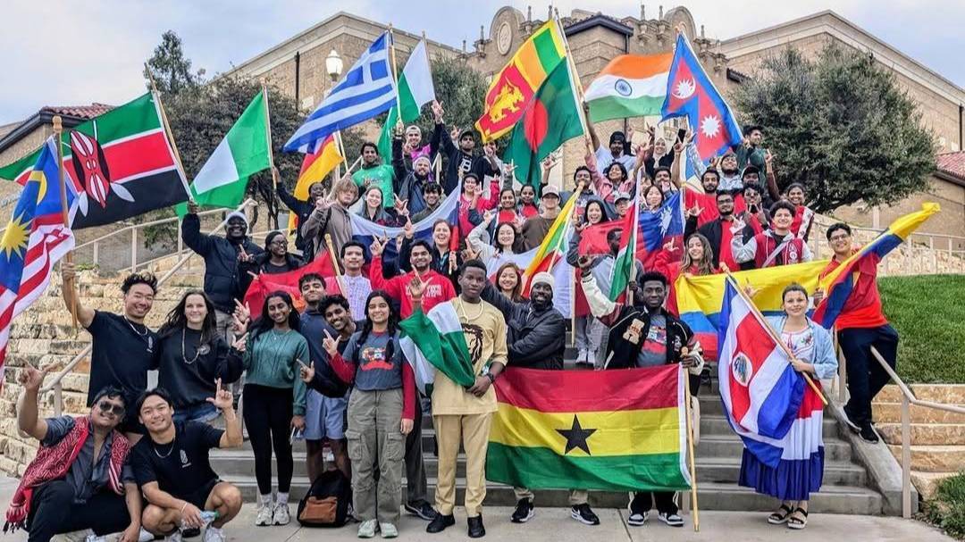 TTU Graduate School Sponsored Students Group Photo with Flags of Countries TTU Graduate School Sponsored Students Group Photo with Flags of Countries