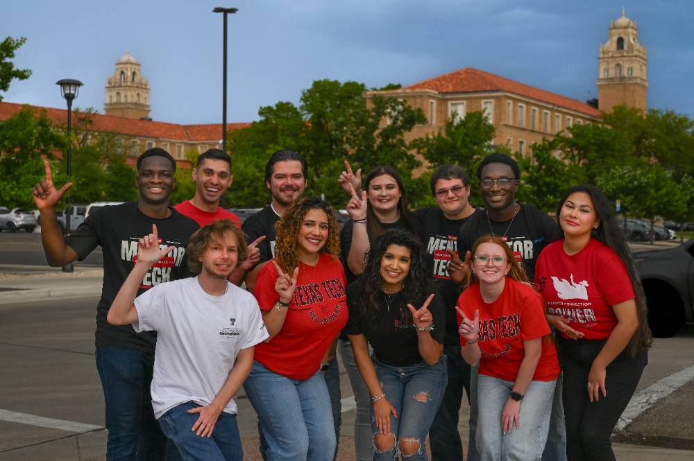 Students gather with guns up outside the Texas Tech Admin building.