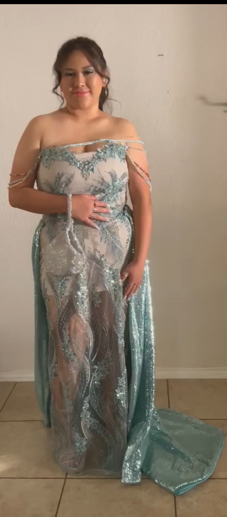 Brittanney Sanchez, Tranfer Ambassador, poses in formalwear