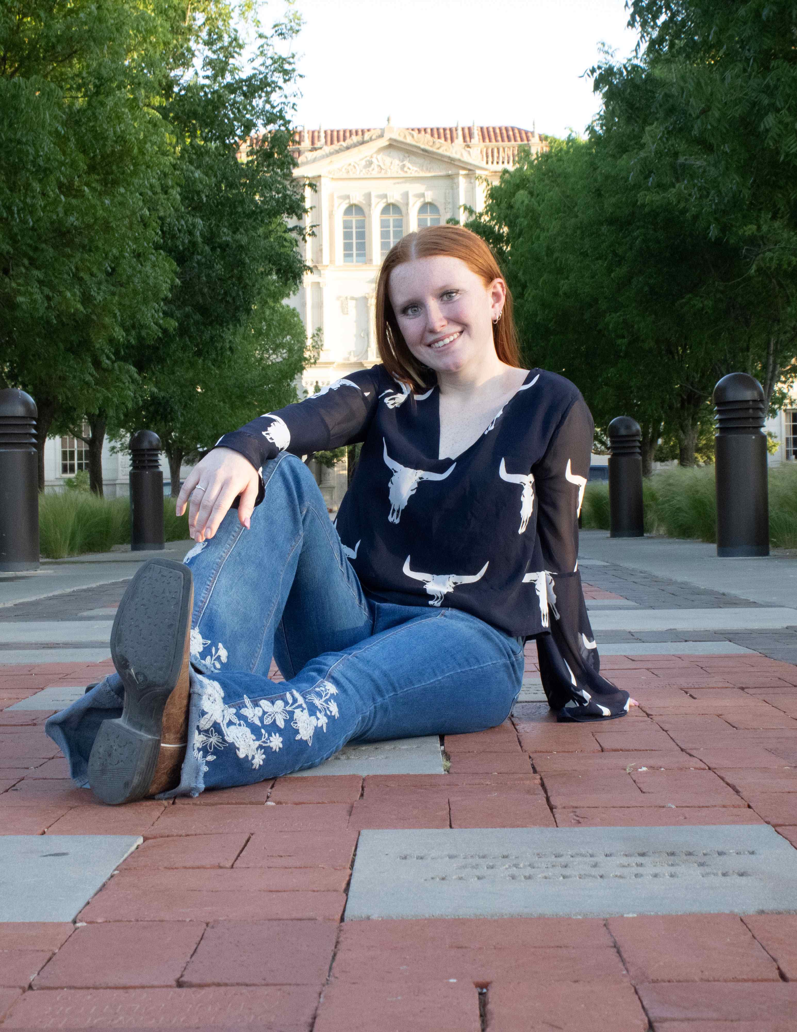 Madi, Transfer Ambassador, in boots at texas tech