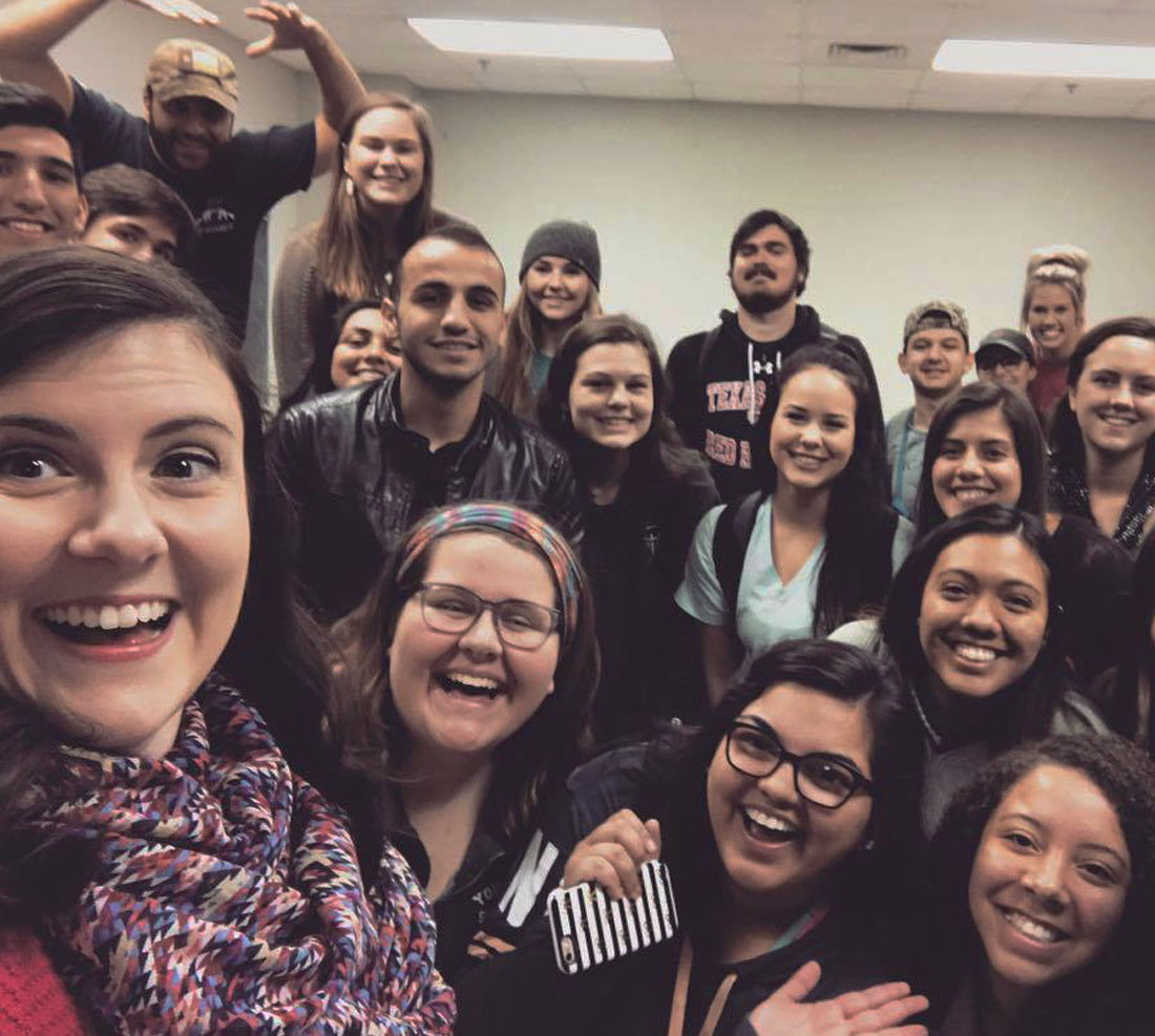 TTU Theatre faculty taking a selfie with multiple students