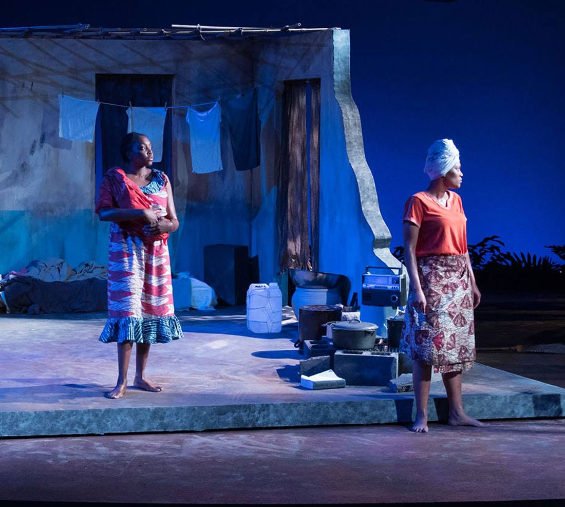 TTU Theatre students performing with a house set design in background