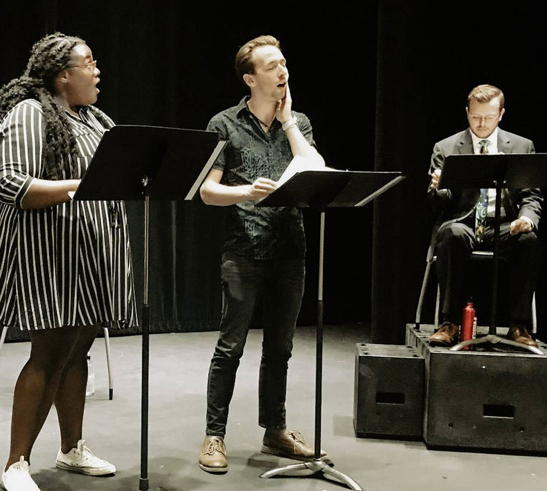 TTU Theatre students reading through a play script