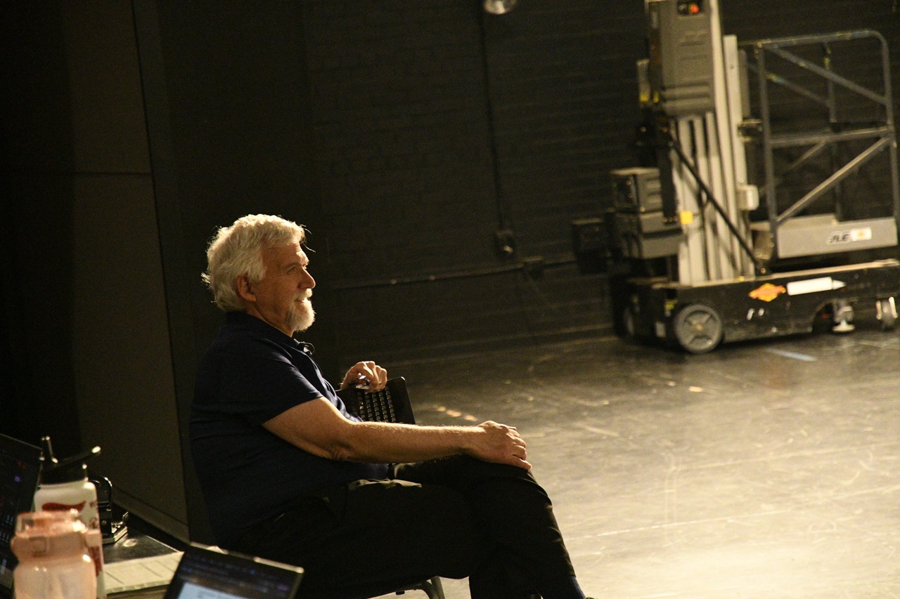 Dr. Bill Gelber watches Hamlet rehearsal.