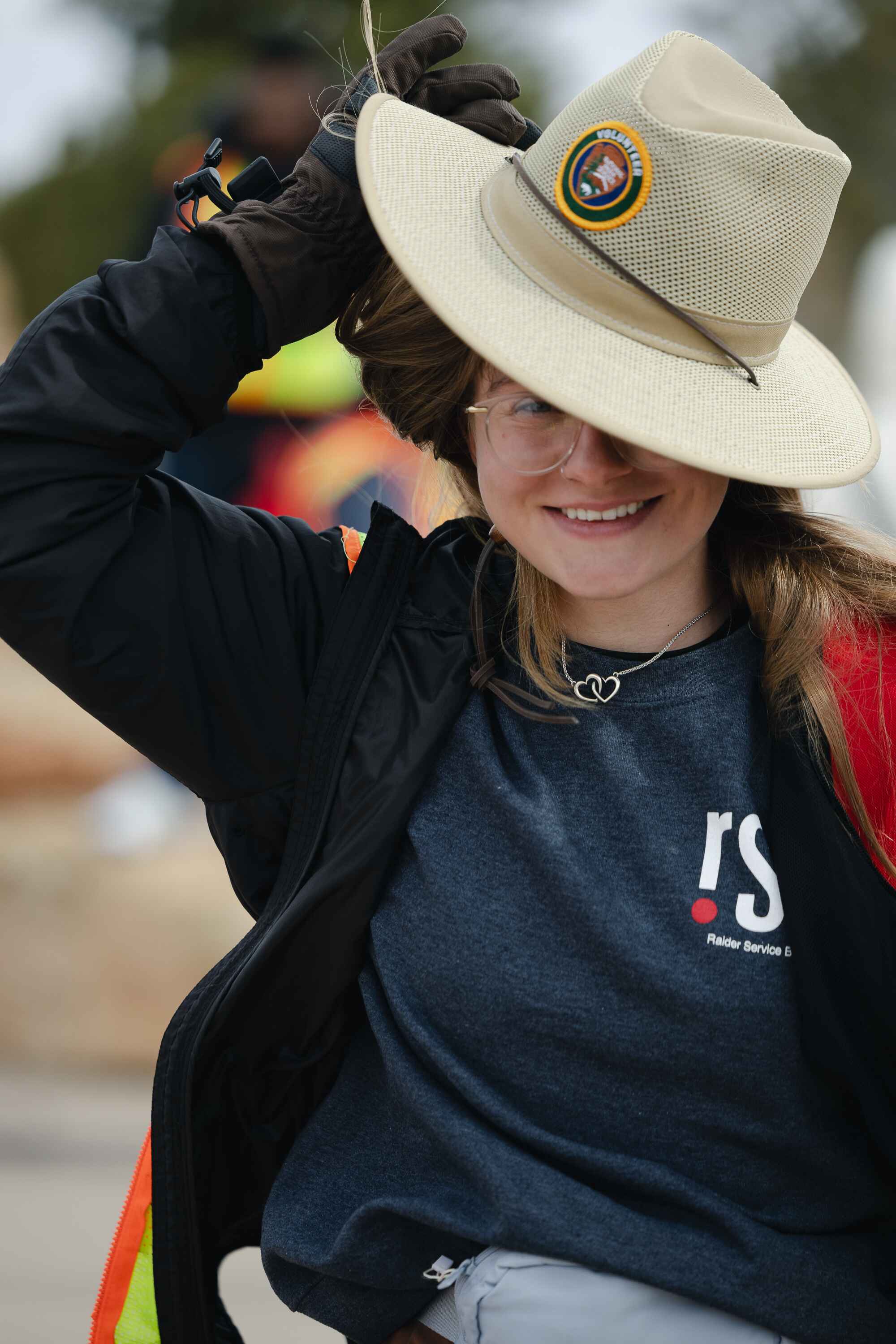 Taylin's first day volunteering, hat flew off.