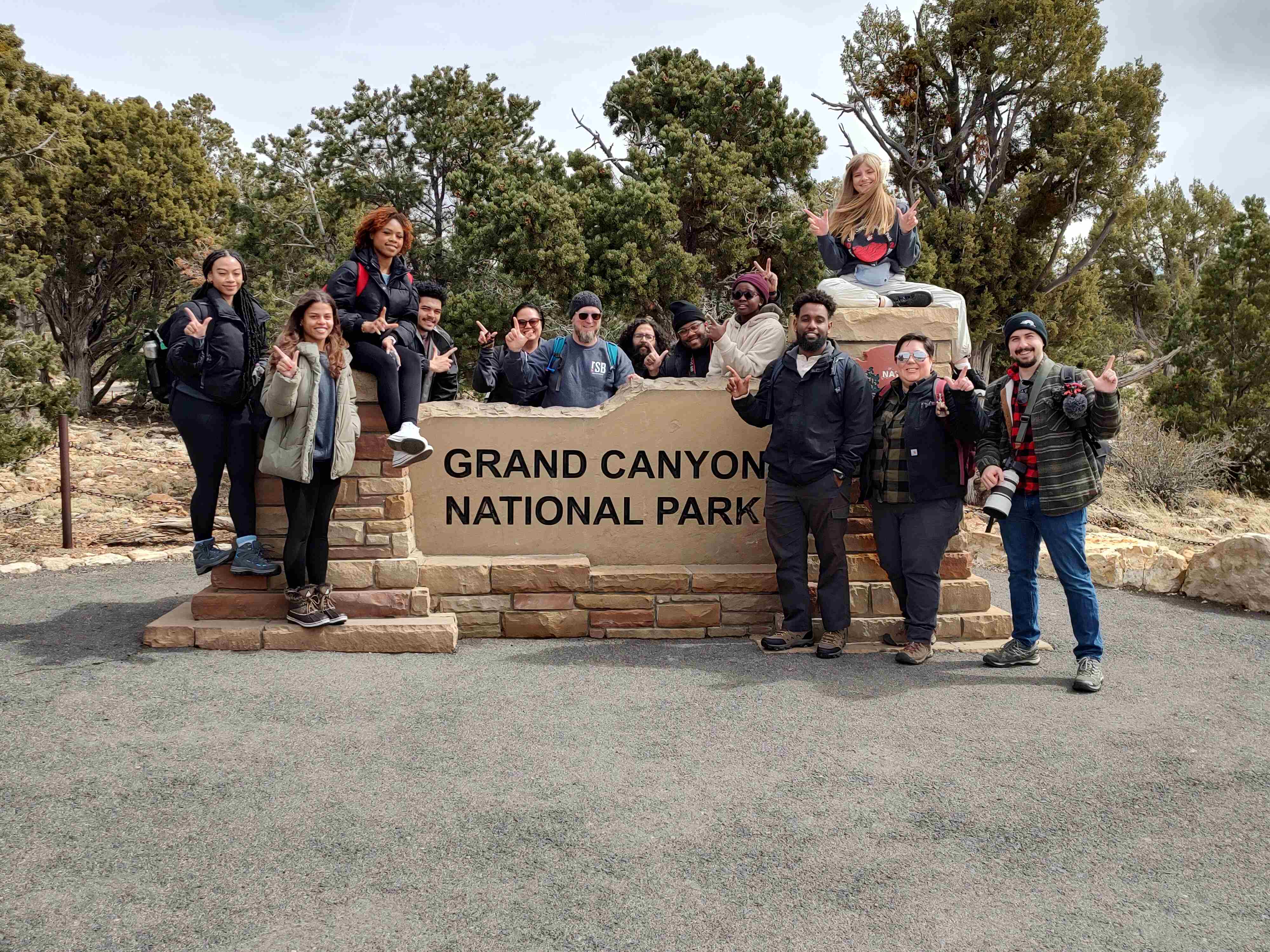 Group picture at the Grand Canyon signboard