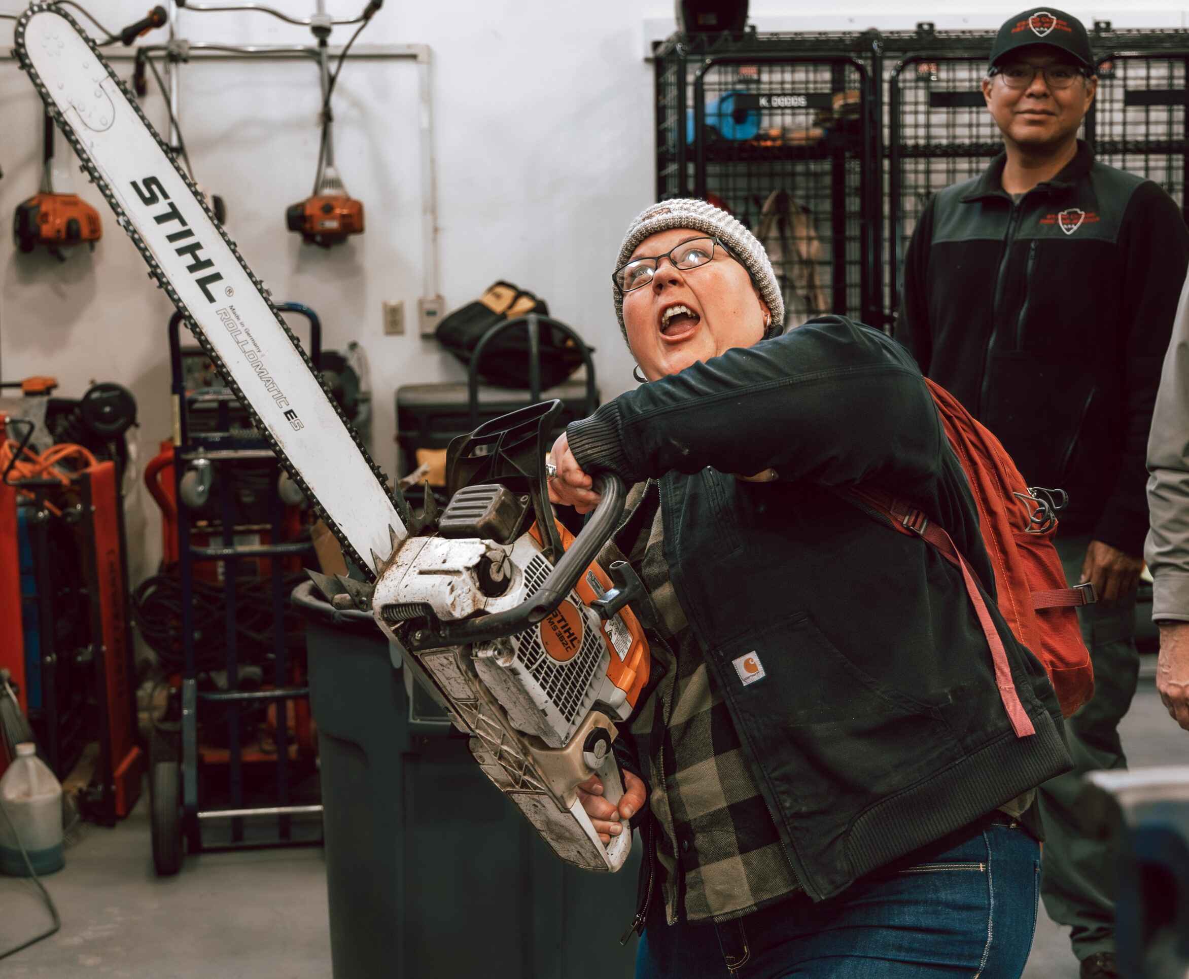Sarah with a chainsaw
