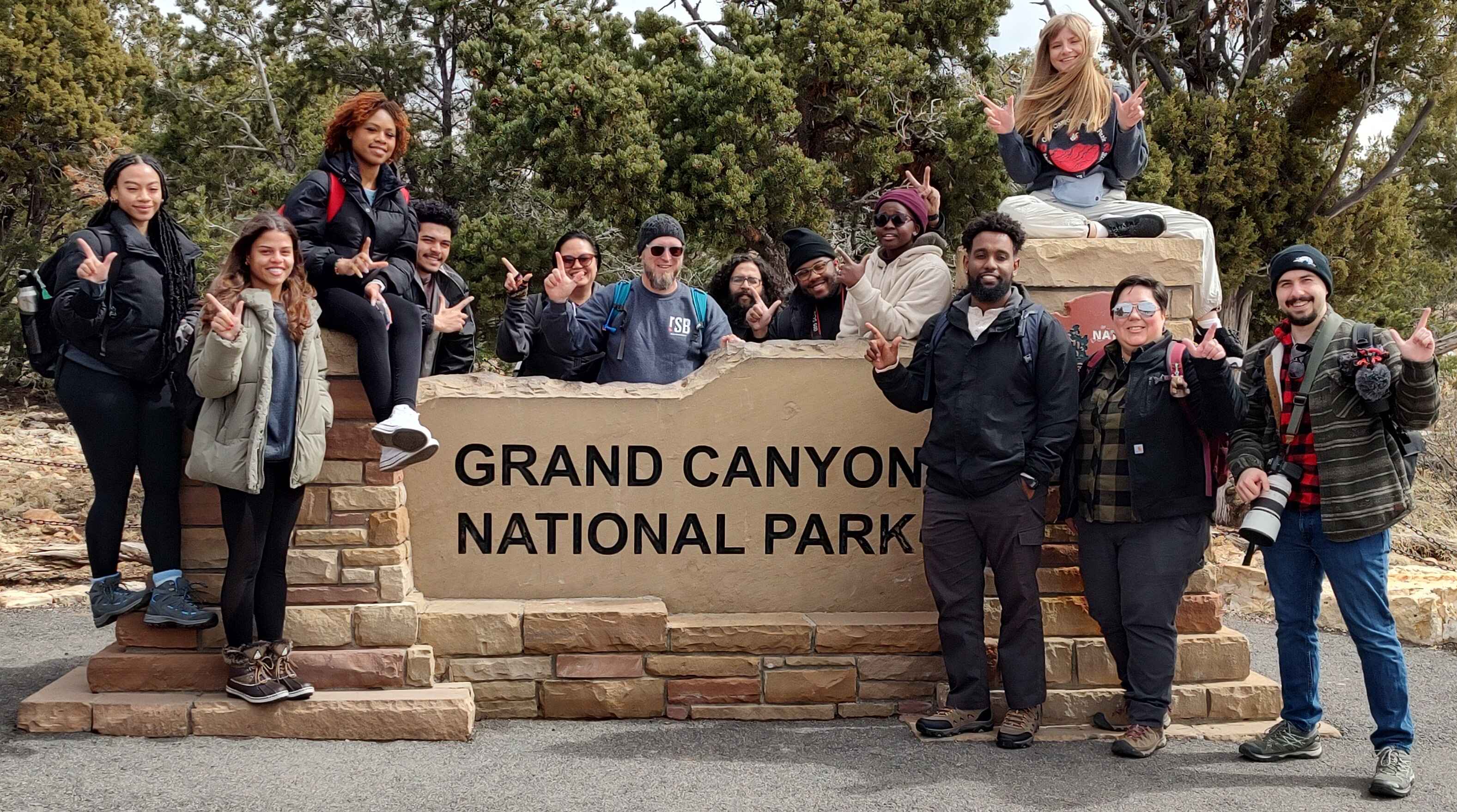 The group around the Grand Canyon National Park Sign