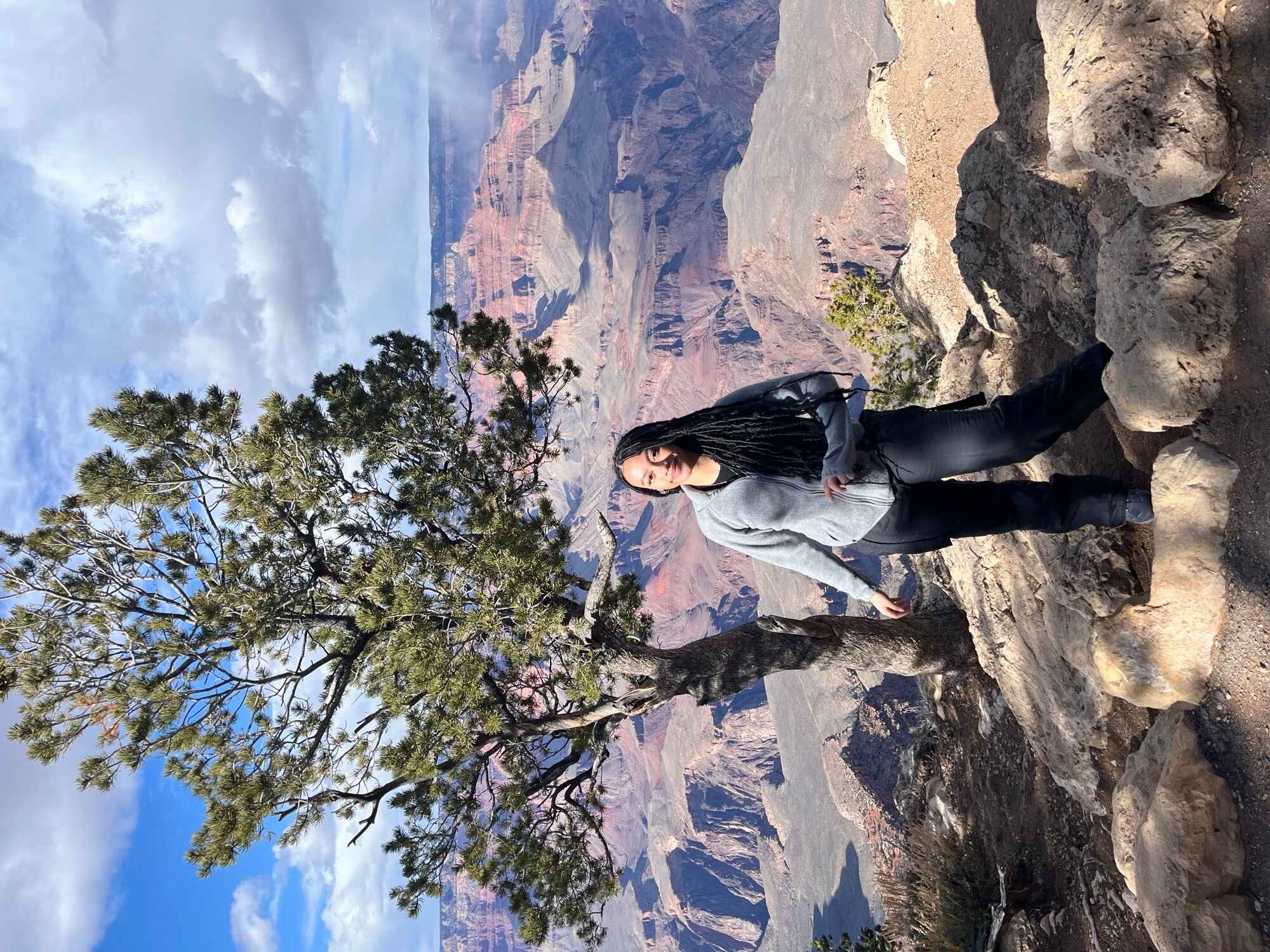 Brooke standing in front of a tree at Grand Canyon