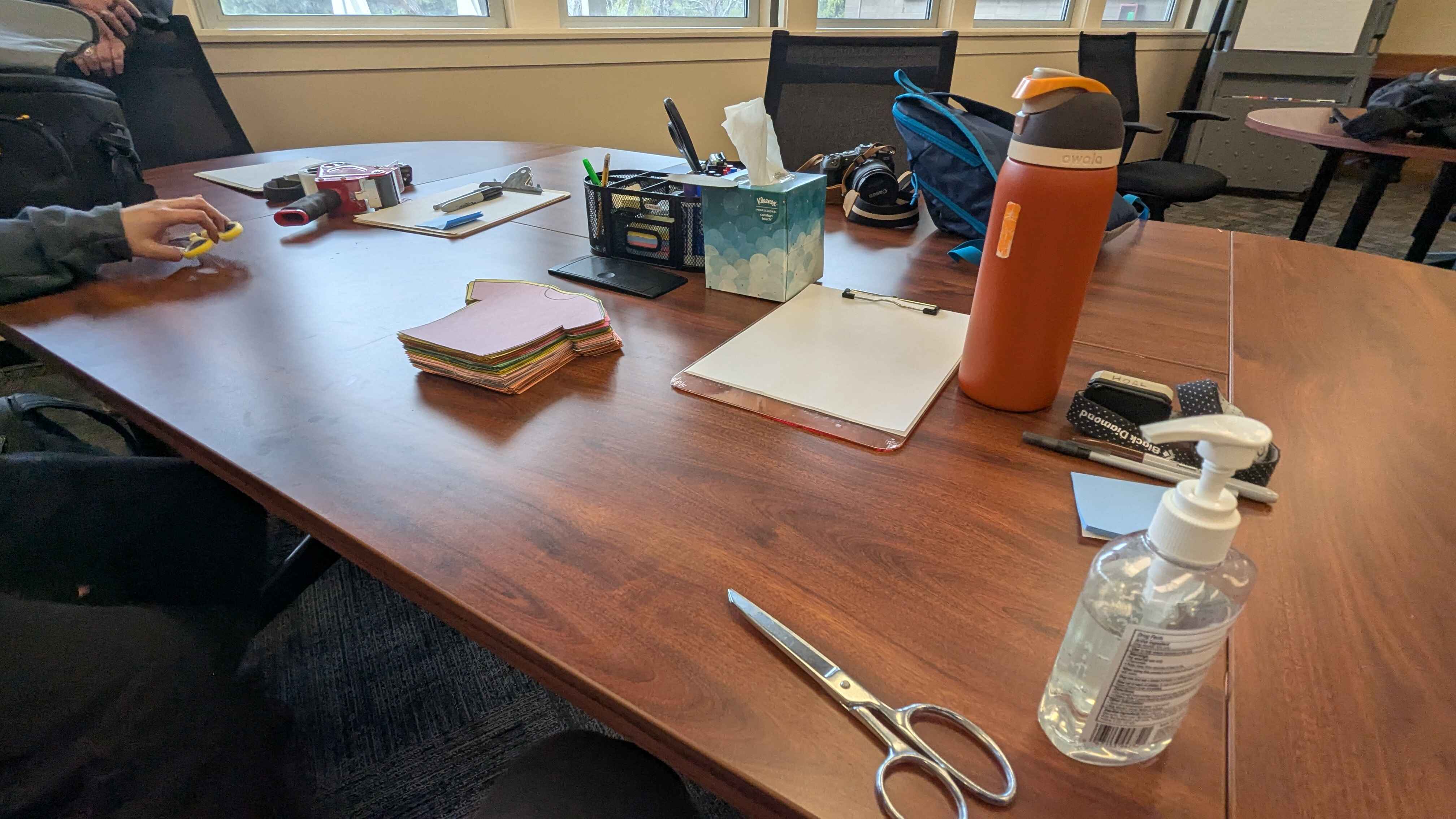 A table with some stationary on it