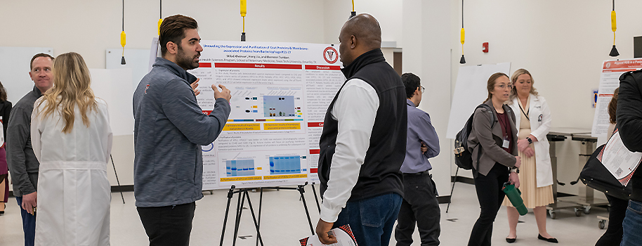 Phi Zeta Research Day graduate student presenting his poster