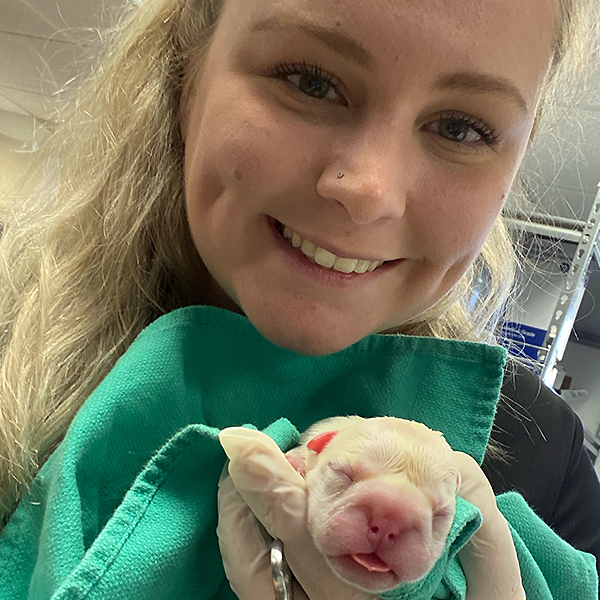 Student with puppy