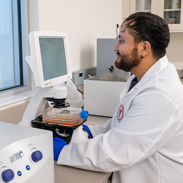 Tomas Lugo working in lab