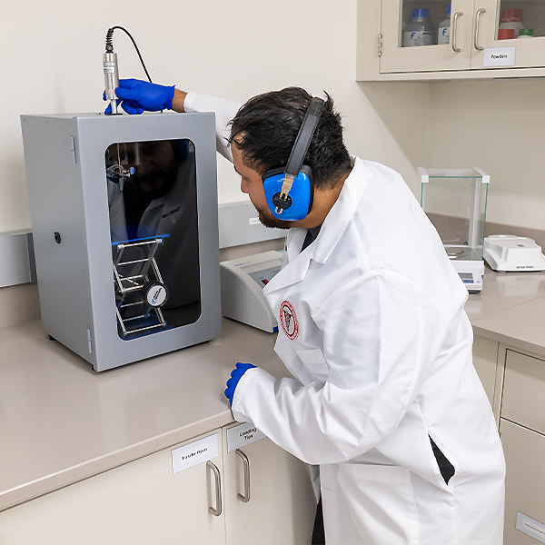 Tomas Lugo working with lab equipment