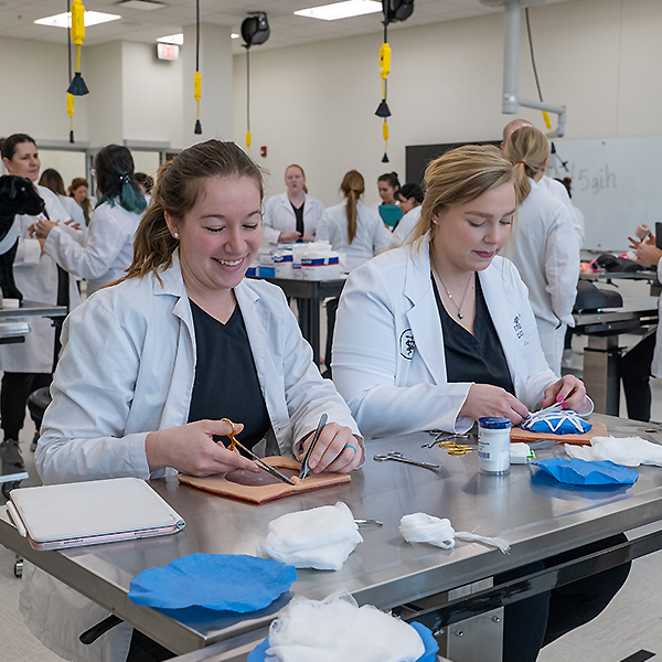 Crystal Randolph practicing her suture skills 